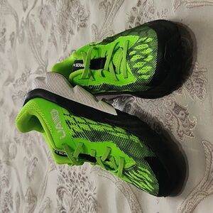 Neon green under armour shoes (for kids)
